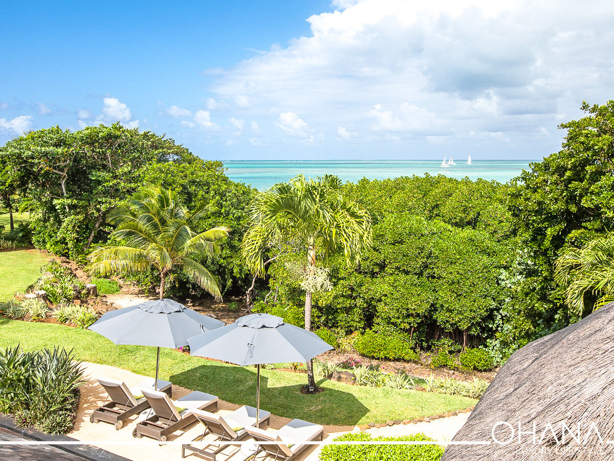 Image showcasing the process of buying a luxury villa with Ohana Mauritius in the beautiful setting of Mauritius