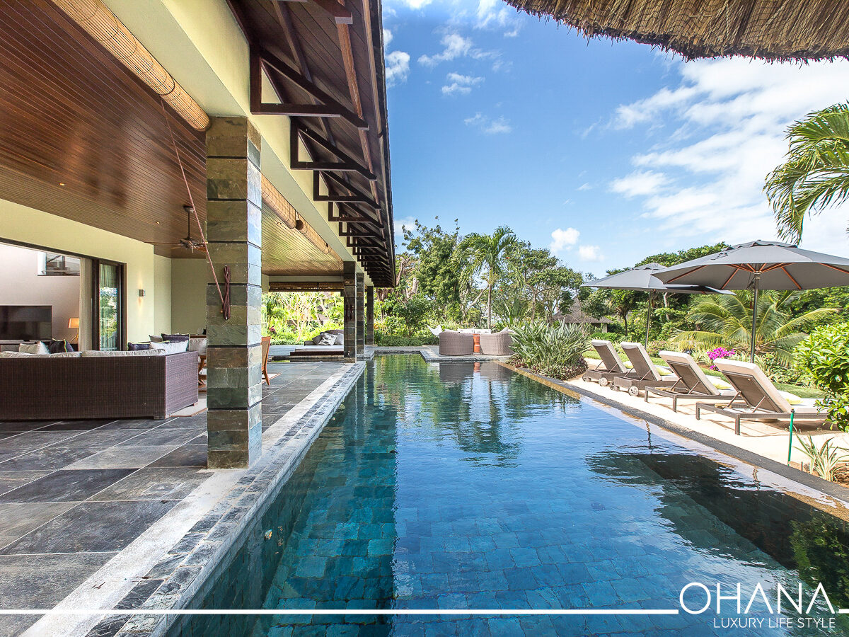 Image showcasing the process of buying a luxury villa with Ohana Mauritius in the beautiful setting of Mauritius