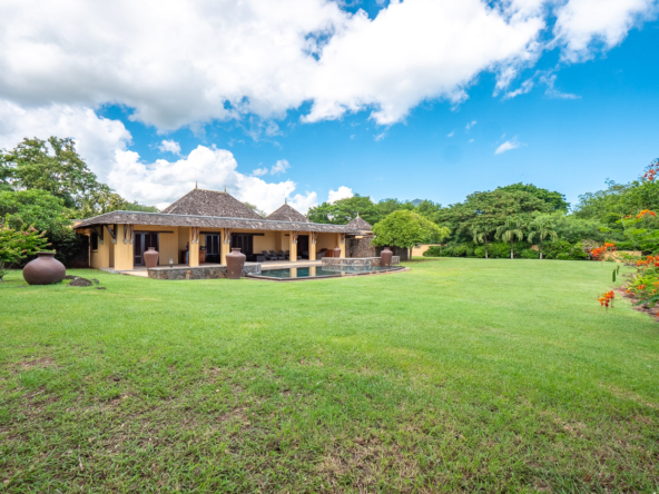 Outdoor lounge area facing Tamarina Golf in Ohana Heritage Group villa